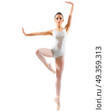 Young ballerina isolated on white. Young ballerina isolated. Стоковое фото, агентство Ingram Publishing / Фотобанк Лори