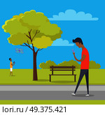 Boy looks at smartphone and walks in park where other guy plays with quadrocopter. Green tree, wooden bench, bushes and clouds on background. Vector illustration of modern outdoor recreation.. Boy with Smartphone on Walk in Park out of Town. Стоковая иллюстрация, агентство Ingram Publishing / Фотобанк Лори