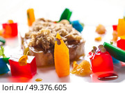 Foie slice with grated white truffle and colorful jelly decoration. Стоковое фото, агентство Ingram Publishing / Фотобанк Лори