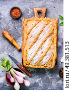 Homemade pie with egg, spinach and onion stuffing. Pie with green and eggs. Стоковое фото, агентство Ingram Publishing / Фотобанк Лори
