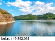 Vidraru artificial lake and dam on Arges river in Transylvania, Romania. Beautiful landscape in Carpathian mountains, Fagaras ridge. Стоковое фото, агентство Ingram Publishing / Фотобанк Лори