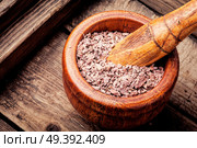 Grinded rhizomes of plant iris in mortar.Herbal medicine.Herbalism. Grinded rhizomes of iris. Стоковое фото, агентство Ingram Publishing / Фотобанк Лори