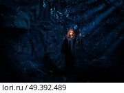 Young witch in night forest. Стоковое фото, агентство Ingram Publishing / Фотобанк Лори