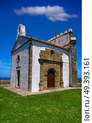 Ribadesella Ermita la Guia hermitage in Asturias of Spain. Стоковое фото, агентство Ingram Publishing / Фотобанк Лори