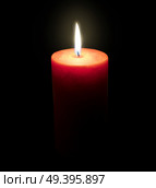 Burning candle isolated on black. Стоковое фото, агентство Ingram Publishing / Фотобанк Лори