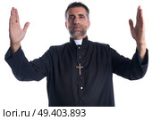 Priest open arms blessing praying God gesture isolated. Стоковое фото, агентство Ingram Publishing / Фотобанк Лори