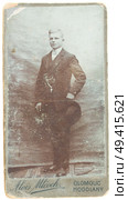 POLAND, WARSAW - CIRCA 1910s: old photo visite portrait of young man in suite with hat. Illustrative Image, subject of human interest. Стоковое фото, агентство Ingram Publishing / Фотобанк Лори