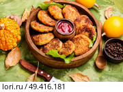 Vegetarian cutlets from autumn pumpkin. Autumn food.Diet concept.. Diet vegetable pumpkin cutlet. Стоковое фото, агентство Ingram Publishing / Фотобанк Лори