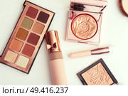 pink set of new cosmetics around white . Стоковое фото, агентство Ingram Publishing / Фотобанк Лори