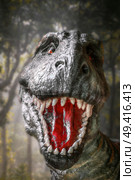 dinosaur tyrannosaurus rex growls in the forest. Стоковое фото, агентство Ingram Publishing / Фотобанк Лори