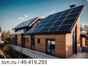 A contemporary house with a sleek solar panel installation on its roof, harnessing renewable energy from the sun. Стоковое AI-изображение, AI-художник Данила Большаков / Фотобанк Лори