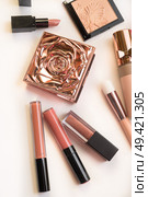 Set of luxury beautiful cosmetics for fashion make up  on white  background. Стоковое фото, агентство Ingram Publishing / Фотобанк Лори