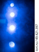 rays of light illuminate the scene at the concert. Стоковое фото, агентство Ingram Publishing / Фотобанк Лори