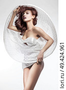 Portrait of a sensual woman wearing modern dress. Стоковое фото, агентство Ingram Publishing / Фотобанк Лори