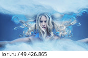 Young blond nymph wielding magic dust. Стоковое фото, агентство Ingram Publishing / Фотобанк Лори