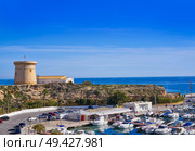 Campello Isleta or illeta Tower and Marina boats in alicante of Spain. Стоковое фото, агентство Ingram Publishing / Фотобанк Лори