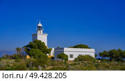 Faro de Santa Pola lighthouse in Alicante at Costa blanca of Spain. Стоковое фото, агентство Ingram Publishing / Фотобанк Лори