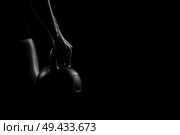 Силовая женская тренировка с гирей. Стоковое AI-изображение, AI-художник Александр Жуков / Фотобанк Лори