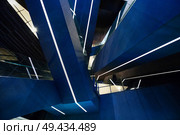 Bottom view of escalators at the modern shopping mall, Tokyo, Japan. Abstract pattern.. abstract background of escalators at the modern shopping mall. Стоковое фото, агентство Ingram Publishing / Фотобанк Лори