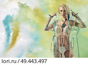 Beautiful young lady wearing a transparent raincoat. Стоковое фото, агентство Ingram Publishing / Фотобанк Лори