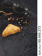  Turkish baklava with organic black tea                              . Стоковое фото, агентство Ingram Publishing / Фотобанк Лори