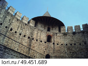 Ruined stone walls of an ancient military fortress. Historical landmark, medieval citadel in Soroca, Moldova. Стоковое фото, агентство Ingram Publishing / Фотобанк Лори