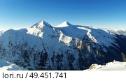 Winter panorama of Pirin mountains covered with snow in Bansko, Bulgaria. Стоковое фото, агентство Ingram Publishing / Фотобанк Лори