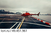 Helicopter used for sightseeing tours parked near Hudson River in New York City. Стоковое фото, агентство Ingram Publishing / Фотобанк Лори