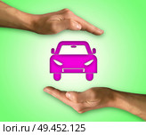 Two hands in position to protect a car. Insurance coverage, support, assurance, reliability concept. Стоковое фото, агентство Ingram Publishing / Фотобанк Лори