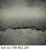 Pothole image of a broken cracked asphalt pavement with a dirty water puddle. Road damage risk and the car insurance concept. Стоковое фото, агентство Ingram Publishing / Фотобанк Лори