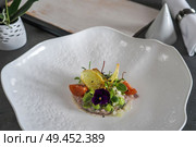 Beautiful and tasty gourmet food with menu . Стоковое фото, агентство Ingram Publishing / Фотобанк Лори