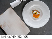 Beautiful and tasty gourmet food with menu . Стоковое фото, агентство Ingram Publishing / Фотобанк Лори