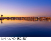 Tarragona port sunset with sea reflection in Catalonia. Стоковое фото, агентство Ingram Publishing / Фотобанк Лори