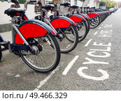 Bicycles for rent on The Docking Station in London, UK. Bicycles for rent at their station in London. Стоковое фото, агентство Ingram Publishing / Фотобанк Лори