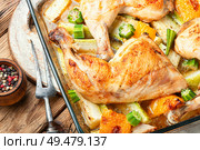 Chicken with vegetables.Chicken thighs baked with zucchini. Grilled chicken. Baked chicken with zucchini. Стоковое фото, агентство Ingram Publishing / Фотобанк Лори