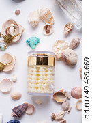 precious skin care cosmetics around  natural shells and gemstones. close up. Стоковое фото, агентство Ingram Publishing / Фотобанк Лори