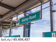 Abbey Road DLR Station Sign, London Docklands Light Railway. London, UK, 14 April 2024. Редакционное фото, фотограф Zydrius Tartenis / Фотобанк Лори