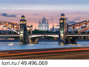 Санкт-Петербург. Смольный собор в проеме Большеохтинского моста (2025 год) Редакционное фото, фотограф Юрий Кирсанов / Фотобанк Лори