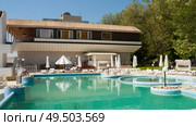ST.ST.CONSTANTINE AND HELENA, VARNA REGION, BULGARIA - MAY 13, 2015: hotel Marina and tourists resting in thermal swimming pool. Редакционное фото, фотограф ИВА Афонская / Фотобанк Лори