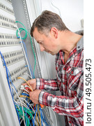 a happy server maintenance worker. Стоковое фото, агентство Ingram Publishing / Фотобанк Лори