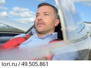 View of man in aircraft. Стоковое фото, агентство Ingram Publishing / Фотобанк Лори
