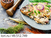 Baked fish at the Christmas table.Holiday food.Baked crucian.Fish food.. Baked fish for christmas. Стоковое фото, агентство Ingram Publishing / Фотобанк Лори