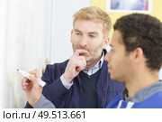 professor is questioning a student. Стоковое фото, агентство Ingram Publishing / Фотобанк Лори