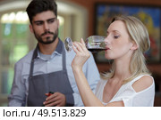 a woman and wine tasting event. Стоковое фото, агентство Ingram Publishing / Фотобанк Лори