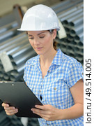 woman is checking the received order. Стоковое фото, агентство Ingram Publishing / Фотобанк Лори