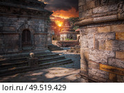 Freely walk monkey. Votive temples and shrines in a row at Pashupatinath Temple, Kathmandu, Nepal. Стоковое фото, агентство Ingram Publishing / Фотобанк Лори