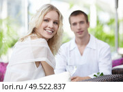 Young couple on a date in a cafe. Стоковое фото, агентство Ingram Publishing / Фотобанк Лори