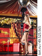 The attractive young girl in night club. Стоковое фото, агентство Ingram Publishing / Фотобанк Лори