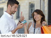 greedy shopaholic wife asking more money to her husband. Стоковое фото, агентство Ingram Publishing / Фотобанк Лори