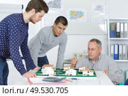 students in architecture class with trainer. Стоковое фото, агентство Ingram Publishing / Фотобанк Лори